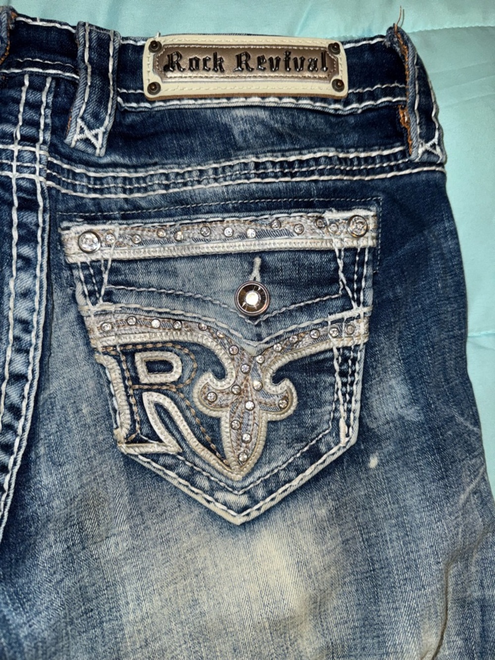 Rock Revival Women's Faded Blue Boot Cut Jeans with Embellished Pockets